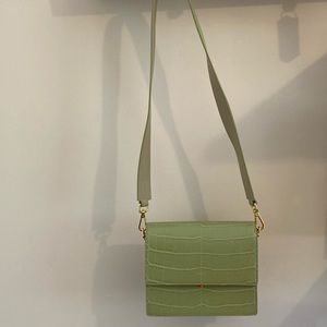 Green crocodile print bag